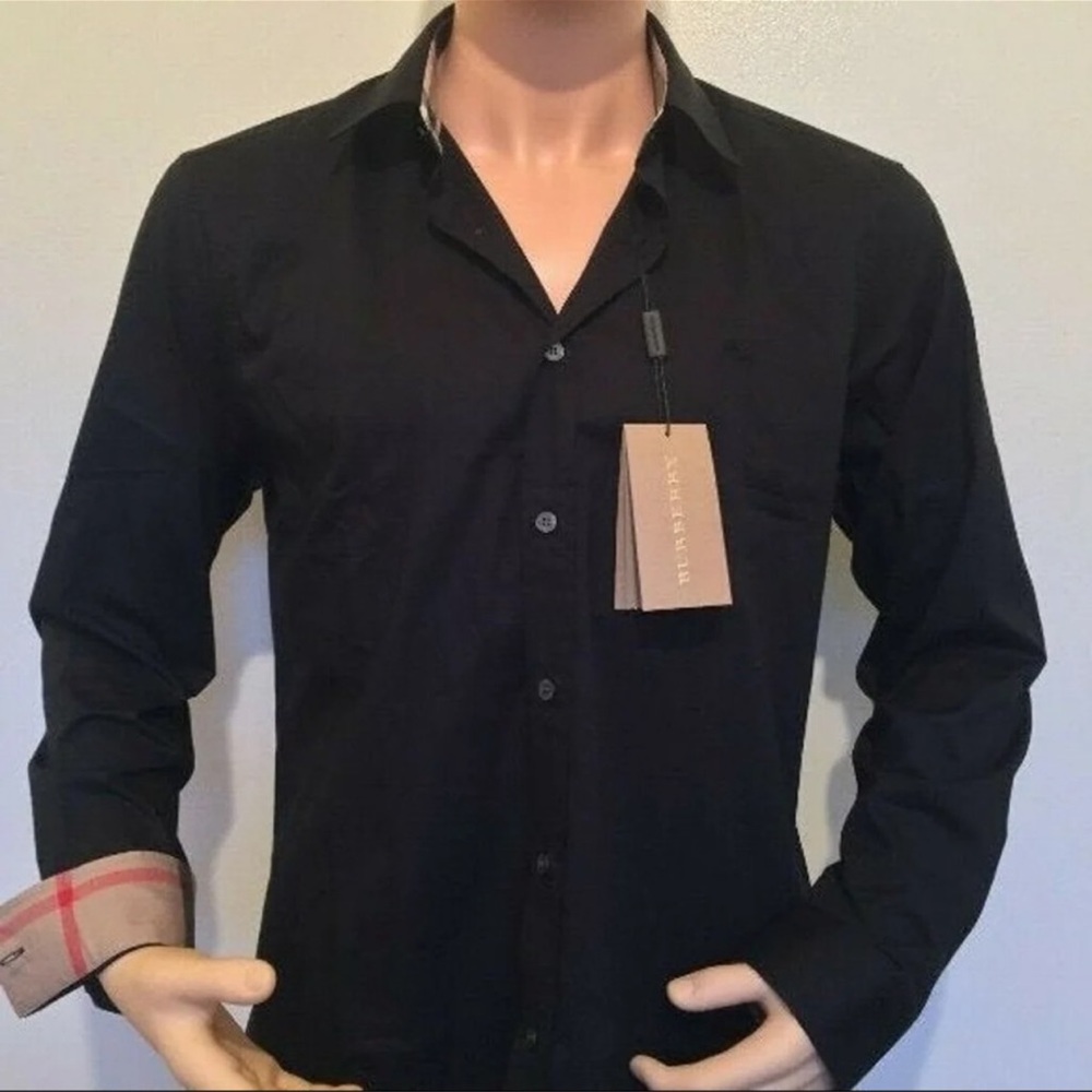 Burberry long sleeves shirt with tag . Missing the collar button